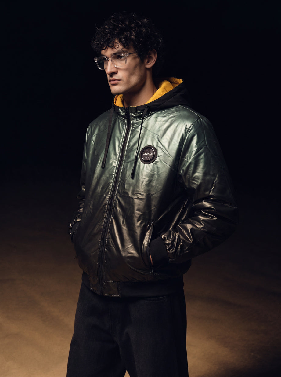Reversible Chrome Puffer Jacket in green, three-quarter view on model