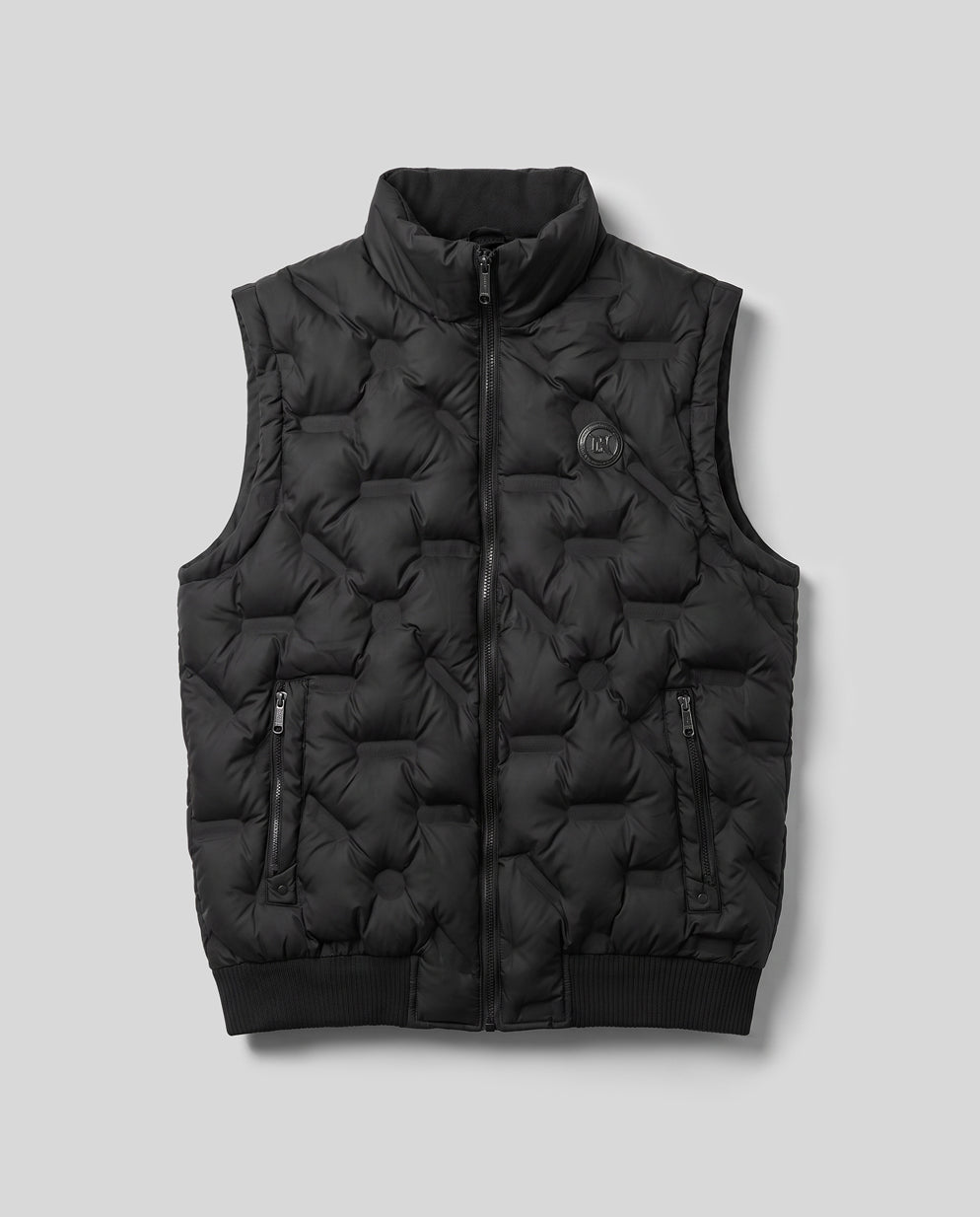 Convertible Quilted Jacket in black, flat view with sleeves removed, worn as a quilted gilet