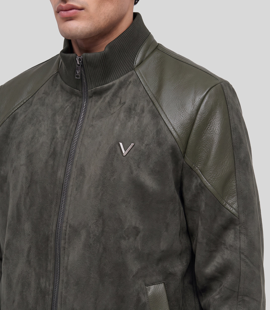 Heritage Suede Bomber Jacket in olive, close-up of the collar and leather shoulder panel