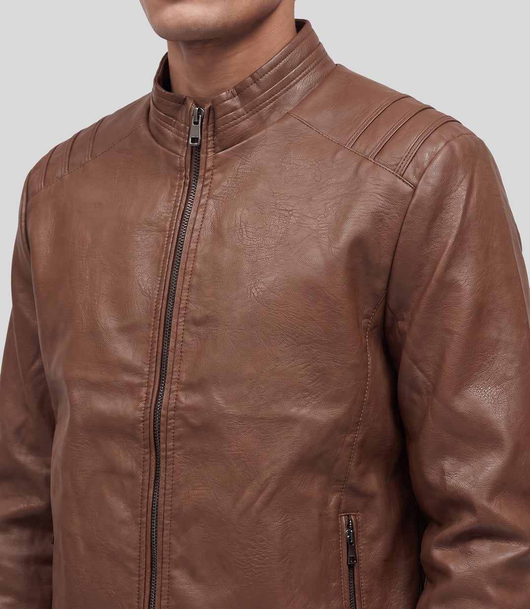 Biker Leather Jacket in tan, close-up of the stand collar and ribbed shoulder