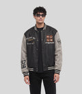 Varsity Bomber Jacket in black, front view on model