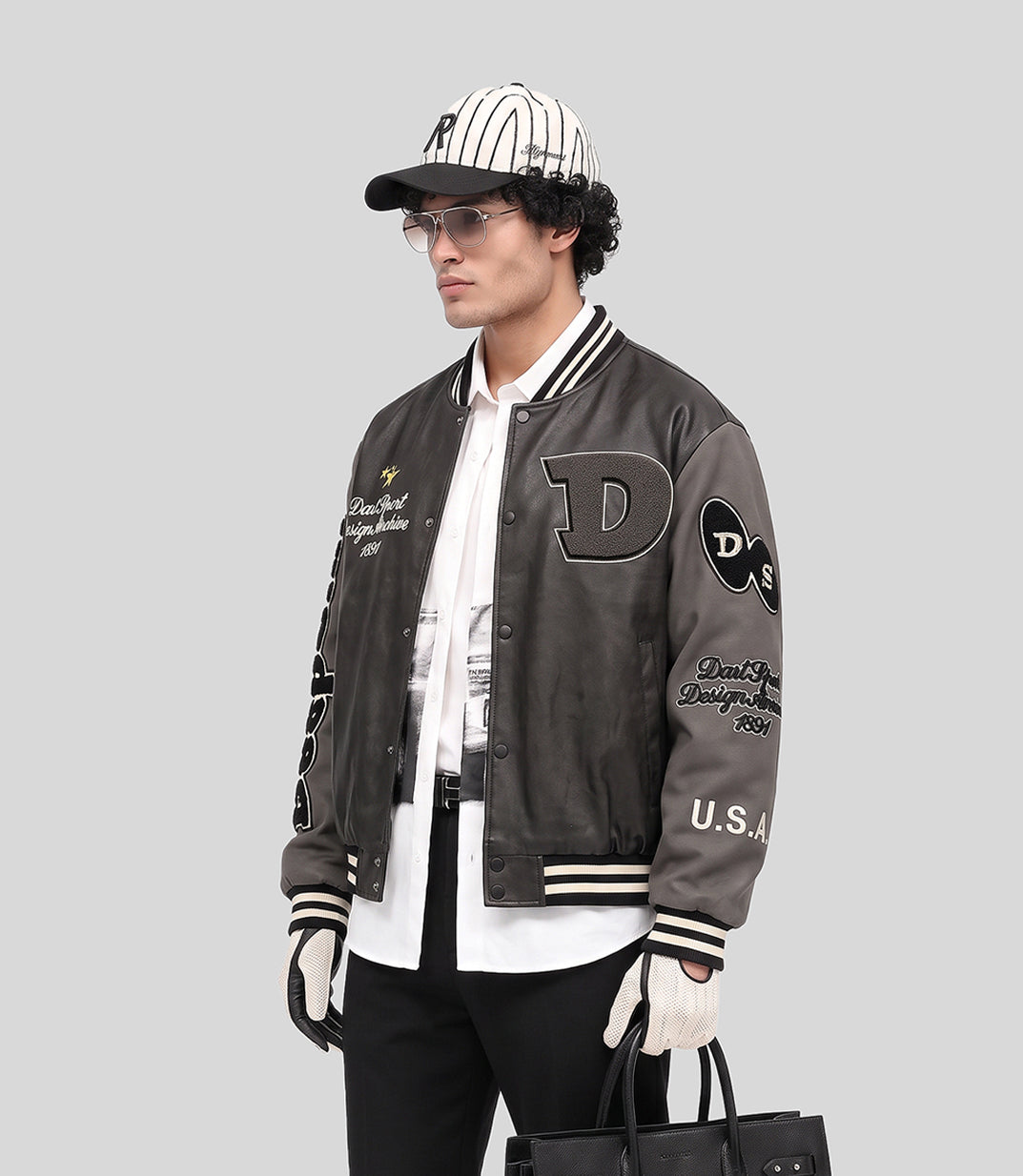 Stone Wash Varsity Jacket in charcoal, front view on model