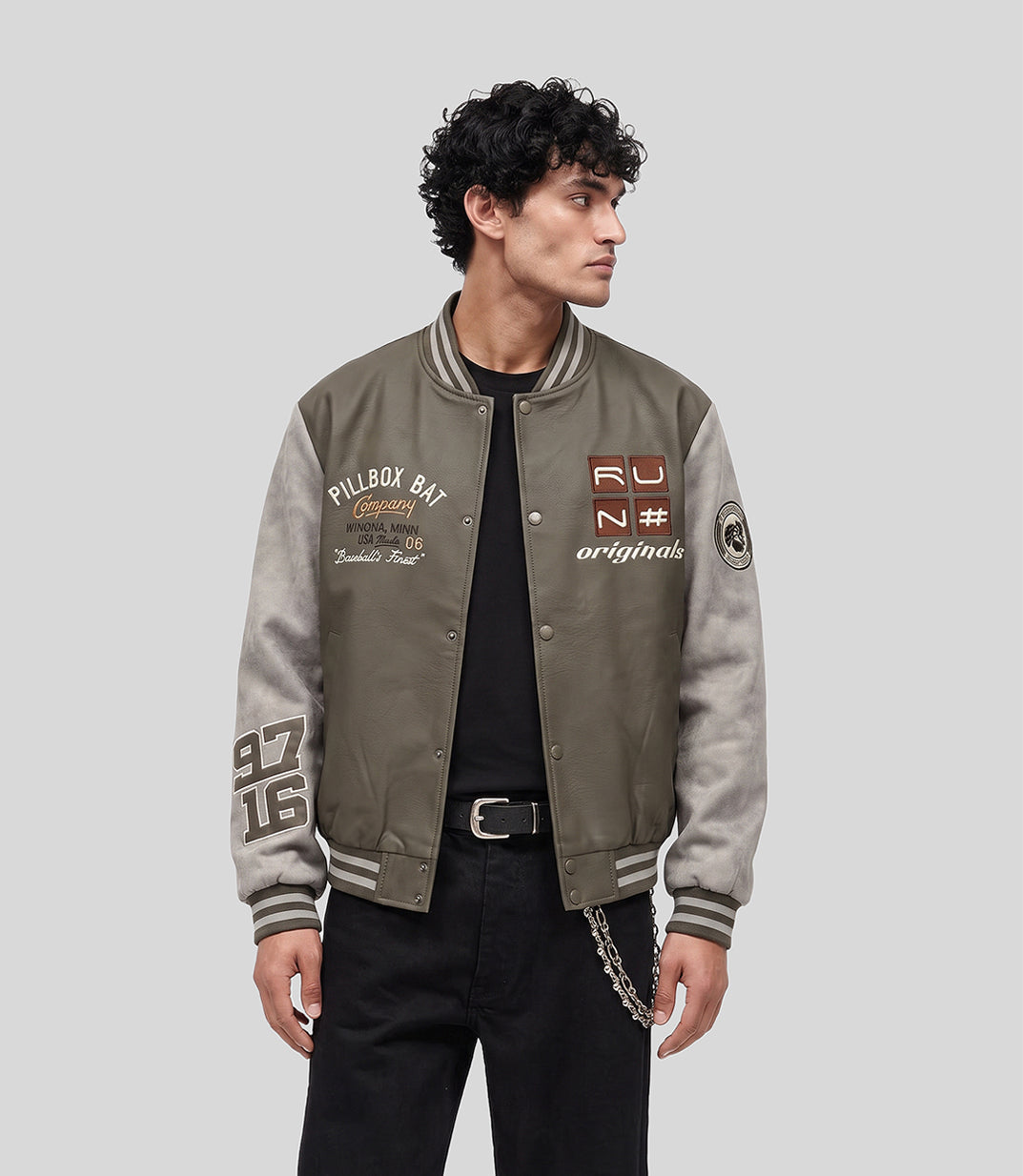 Varsity Bomber Jacket in olive, second front view on model