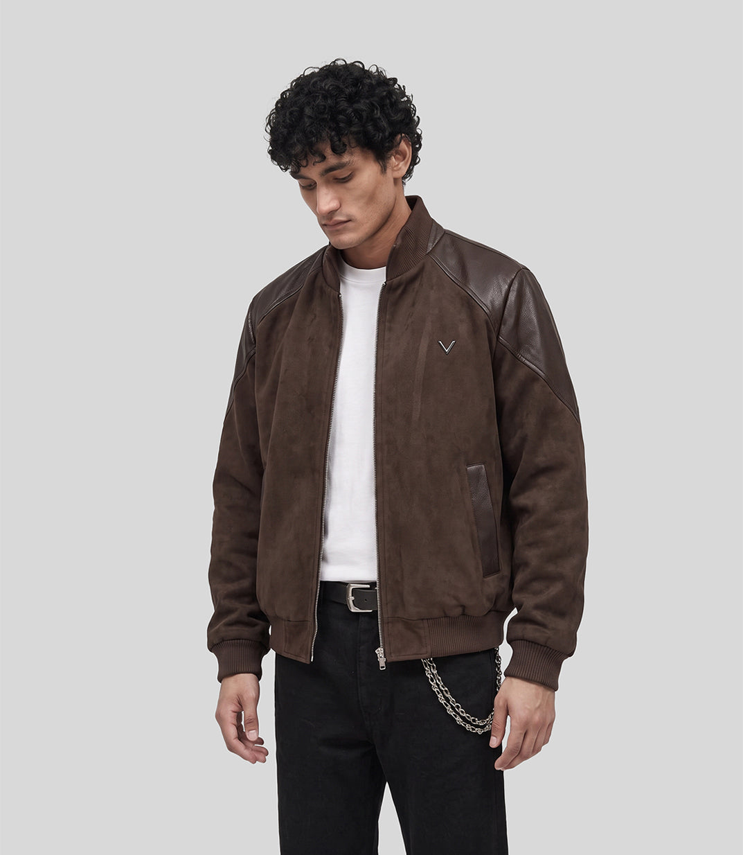 Heritage Suede Bomber Jacket in brown, three-quarter view on model